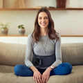 Masajeador lumbar inalámbrico WarmRelief para aliviar el dolor y promover la relajación.
